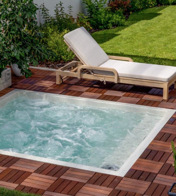 Cocktail pool with wooden deck surround