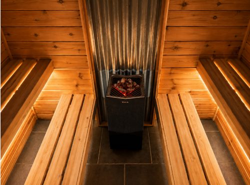 Bespoke sauna heater and cedar benches