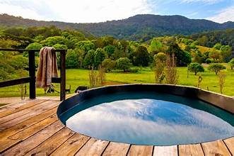 Round hot tub with countryside view
